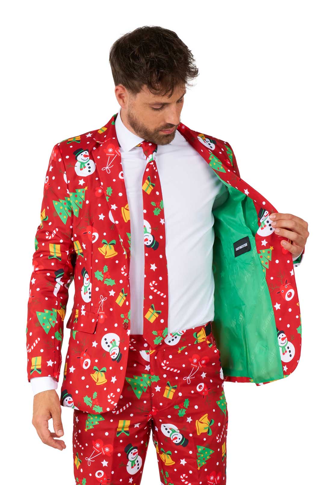 A man wearing the Suitmeister "Christmas Red Icons - Light Up" suit, featuring festive patterns of snowmen, snowflakes, and Christmas trees, is paired with a white shirt and red tie against a white background.