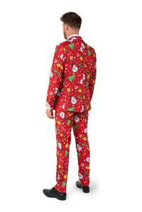 A man wearing the Suitmeister "Christmas Red Icons - Light Up" suit, featuring festive patterns of snowmen, snowflakes, and Christmas trees, is paired with a white shirt and red tie against a white background.