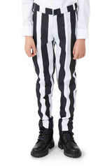 A child wearing the Suitmeister Beetlejuice outfit stands facing forward, donning black boots. The image captures the lower half of the body.
