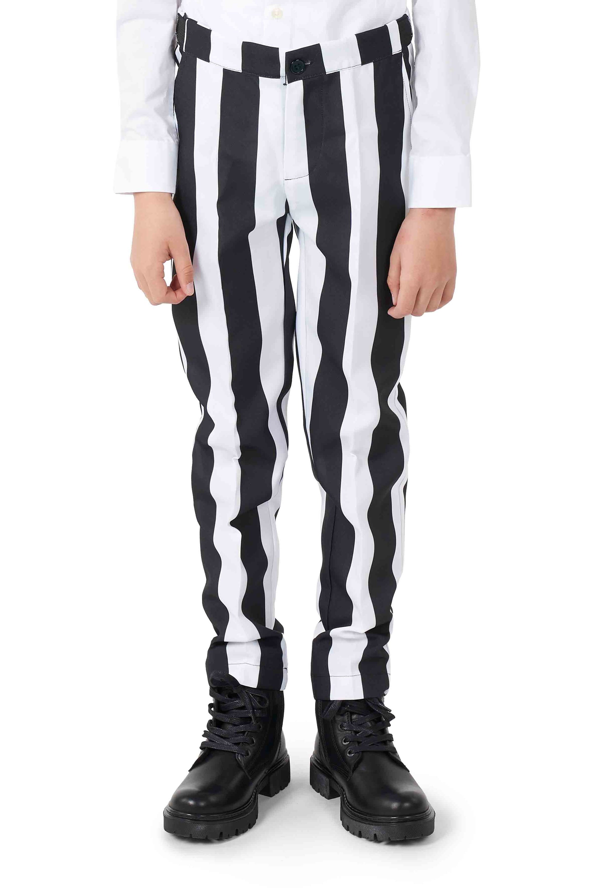 A child wearing the Suitmeister Beetlejuice outfit stands facing forward, donning black boots. The image captures the lower half of the body.
