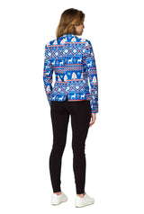 A person facing away, dressed in the Suitmeister Christmas Blue Nordic Jacket, featuring a festive winter pattern with reindeer and snowflakes, paired with black pants and white sneakers against a plain white background.